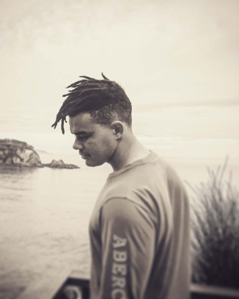 Danny Morris by the sea, black and white