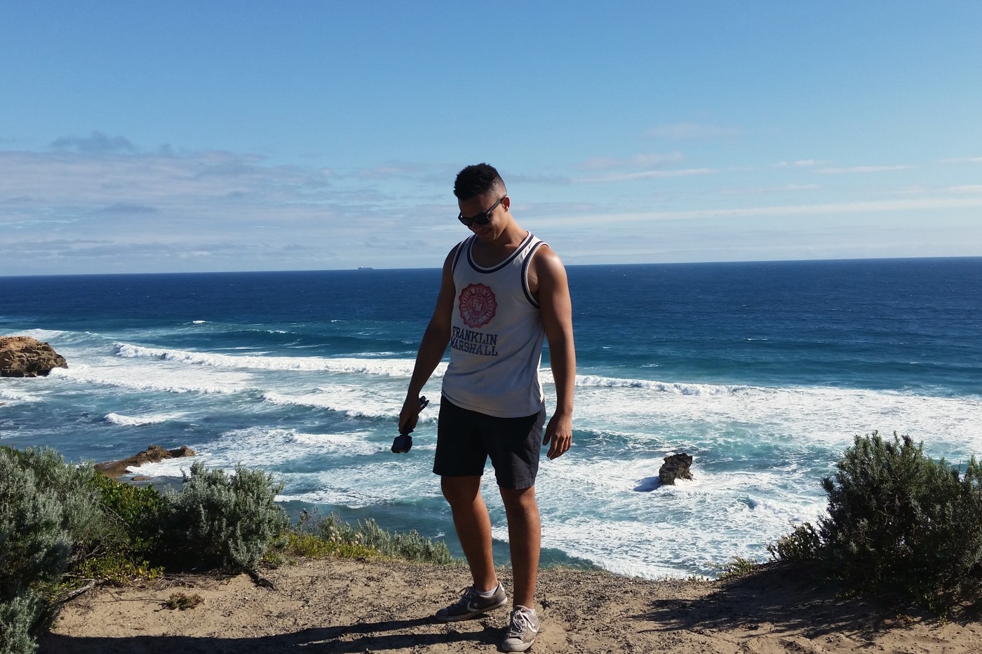 Danny on a clifftop above the ocean